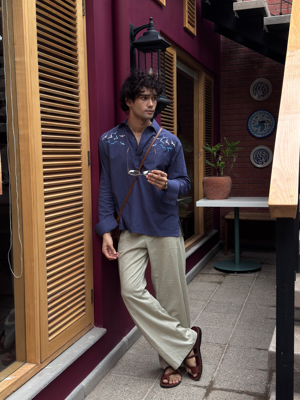 Navy Blue Embroidered Irish Cotton Kurti with Beige Pleated Bootcut Trousers