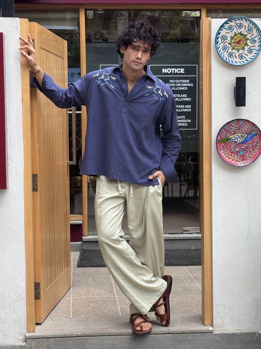 Navy Blue Embroidered Irish Cotton Kurti with Beige Pleated Bootcut Trousers